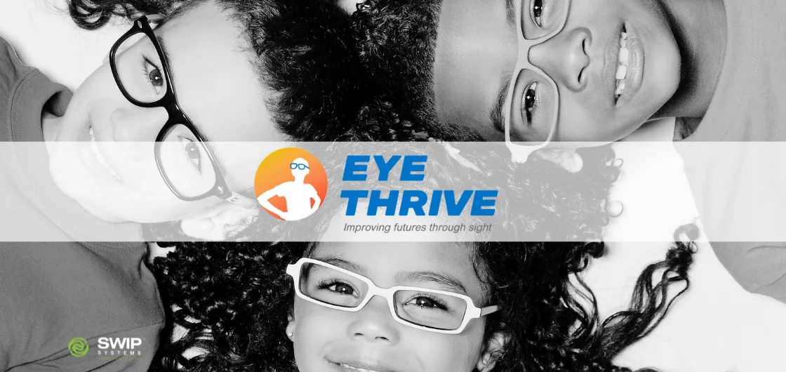 3 children wearing glasses, smiling at the camera